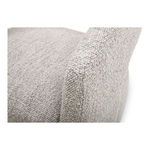Close-up of boucle fabric texture on armrest corner with visible woven loops