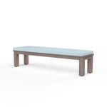 Laguna Dining Bench with hand-brushed aluminum frame in driftwood finish and light blue cushioned seat