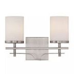Two-light bath bar with white opal cylindrical glass shades and satin nickel finish on a rectangular wall plate