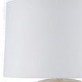 Close-up of plain white drum lamp shade with subtle fabric texture