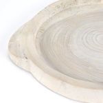 Extreme close-up on carved edge with slight imperfections and natural wood texture