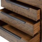 Back panel of darker-stained Wyeth dresser with visible screws securing wood panels