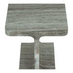 Close-up from above focusing on front inner curve and base of the taupe marble table