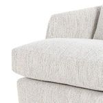 Macro view of thick seat cushion and fabric weave in soft off-white