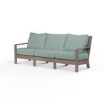 Laguna sofa with three-seat driftwood-finish aluminum frame and muted blue cushions