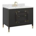 angled black vanity with gold fixtures and ferrule feet seen from side-front corner