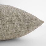 Close-up angled view showing detailed tight weave and fabric texture of the Sisal pillow cover