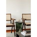Closer living room view with pair of Takashi chairs flanking a green marble side table