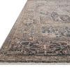 Low profile side angle emphasizing the rug’s flat weave and muted color gradient