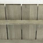 Repeated detailed view of backrest slat support and wood grain