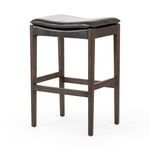 Aya Stool with solid burnt oak legs and black top-grain leather cushion, modern transitional bar stool design