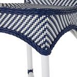 Close-up of curved navy woven trim along seat edge with white and navy weave