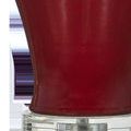 Close-up of deep red ceramic base texture and clear acrylic pedestal of table lamp