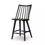 Black oak Lewis Windsor Bar + Counter Stool with wire-brushed cathedral grain, featuring tall spindle back and round legs