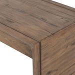 Close-up of Henry Desk corner showing natural oak wood patterns and smooth rounded edge design