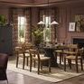 Demi Accent Stool styled in warm dining room with brown walls, dining table, chairs, and plants