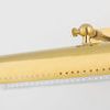 Side view of the Hampshire picture light showing perforated light housing and joint detail on brass arm