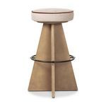 Back view of the Damon swivel stool showing the geometric wooden panels and metal footrest ring