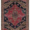 Indoor/outdoor rug with bold tribal medallion design in bright pink, deep blue, gold, gray, and taupe tones