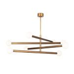 Modern linear chandelier with four brass arms and white globe light covers swiveling around a center rod