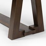 Close-up underneath Silverton Dining Table highlighting structure and attachment points