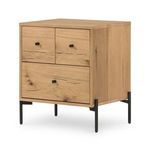 Three-quarter angle of nightstand showing all drawers and black metal legs