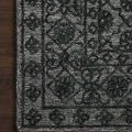 Close-up corner of Cecelia rug on dark wood floor showing detailed pattern and pile texture