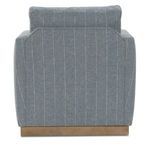 Back view showing clean lines and vertical stripes of the blue Allie swivel chair