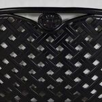 Close-up of decorative black aluminum lattice central medallion