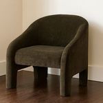 Tuva Accent Chair styled in a room with wood floor and neutral walls