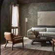 Painting hung on textured grey wall in styled living room with sofa, leather chairs, and wood coffee table