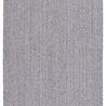 Flatwoven solid black and white indoor/outdoor rug with a heathered dhurrie texture and low-profile design