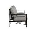 Side on view of sofa highlights plush cushion thickness and open metal armrest with gold accents