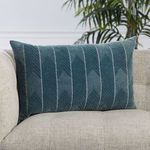 Lumbar pillow displayed on a light beige sofa armrest with soft natural lighting