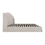 Profile view highlighting the bed's low frame and slat support system