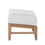 Side view of teak ottoman with white cushion highlighting cushion thickness