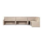 Fabric cushions with subtle tufting detail showcased on corner seat