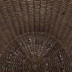 Interior bottom of basket showing circular woven pattern in dark brown