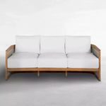 Avalon Teak Sofa front view showing white cushions and wooden base without visible rope sides