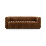 Front view showcasing the sofa’s symmetrical channel stitching and plush velvet texture
