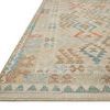 Close-up side angle showing low pile and detailed texture of the Malik Natural Multi Rug
