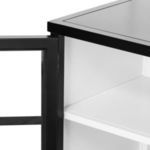 Close-up of smooth white adjustable shelf inside media console