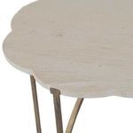 Close-up of limestone tabletop showing smooth texture and subtle natural variations