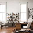Brown and white cowhide rug styled in bright office with wood desk, white chair, and decorative shelving