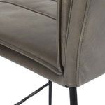 Close-up of corner stitching and leather texture on backrest of Mayer Stool