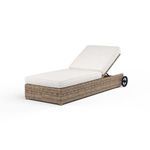 Front angle of Havana chaise with partially raised backrest and textured wicker base