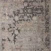 Traditional elongated charcoal and slate rug with distressed floral and geometric pattern