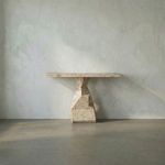 Tilden Console table with sculptural stone base and rectangular top in textured neutral stone finish
