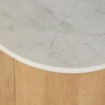 Close-up of white marble tabletop with soft gray veining above the oak body