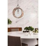 Otago Oval Dining Table styled in dining room with two brown chairs, fruit bowls, and circular pendant light